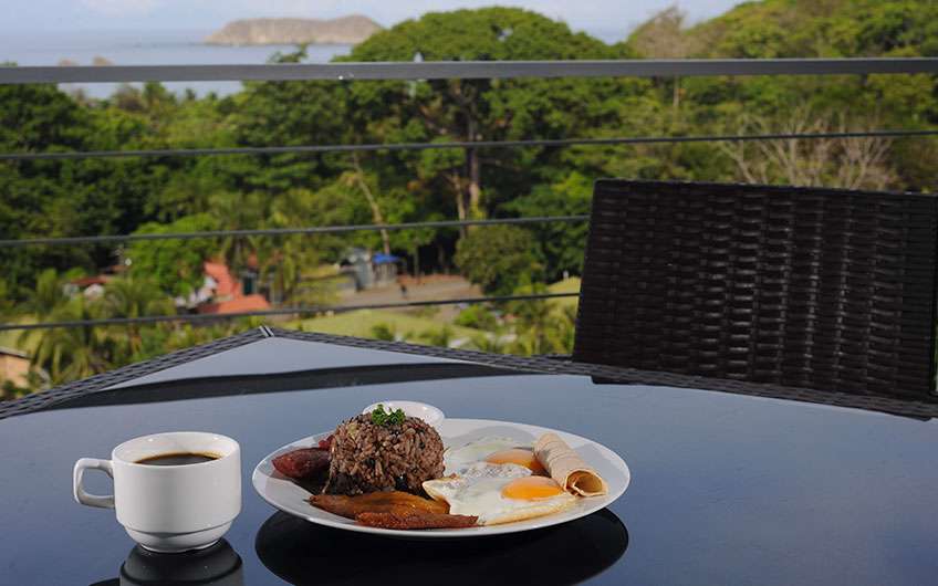 Typical Food Costa Rica Gallo pinto with eggs and coffee